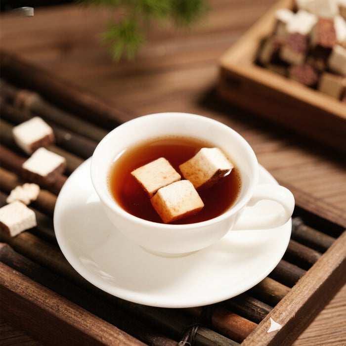 Black tea with poria cocos and Chinese yam tea